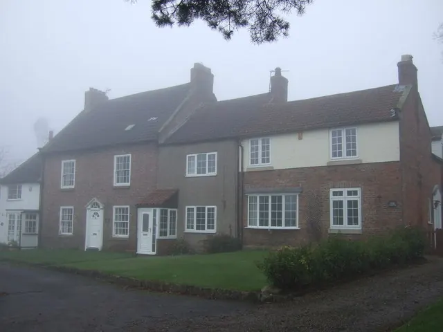 Brick cottages beside the road in Great Smeaton