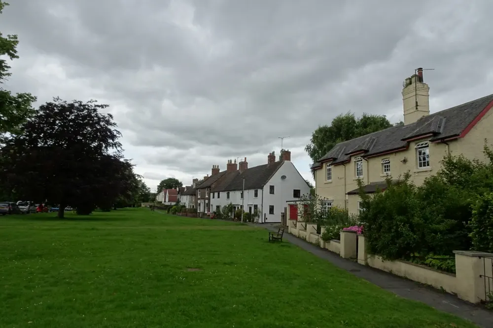Houses along the village green in Romanby